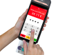 Saisie du code PIN sur un terminal de paiement électronique moderne avec carte bancaire insérée.